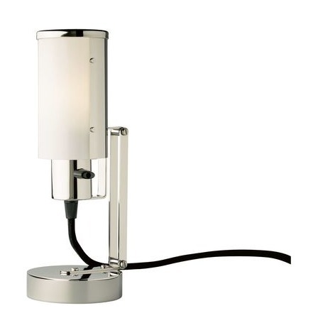 "Nachttischlampe, auch als Wandleuchte verwendbar" war die ursprüngliche Bezeichnung dieser Leuchte im Prospekt der Weimar Bau- und Wohnungskunst GmbH.Wilhelm Wagenfeld entwarf 1930