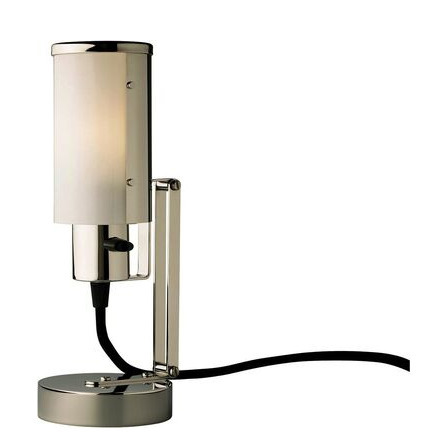"Nachttischlampe, auch als Wandleuchte verwendbar" war die ursprüngliche Bezeichnung dieser Leuchte im Prospekt der Weimar Bau- und Wohnungskunst GmbH.Wilhelm Wagenfeld entwarf 1930