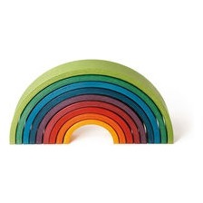 Das Rainbow Spiel von Naef besteht aus neun variablen Bogenelementen aus Holz. Spiel-, Klang- und Kunstobjekt zugleich. RAINBOW - Designobjekt und Spiel